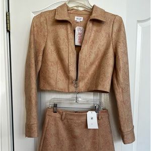 NWT snake print crop jacket and mini skirt with side slit.